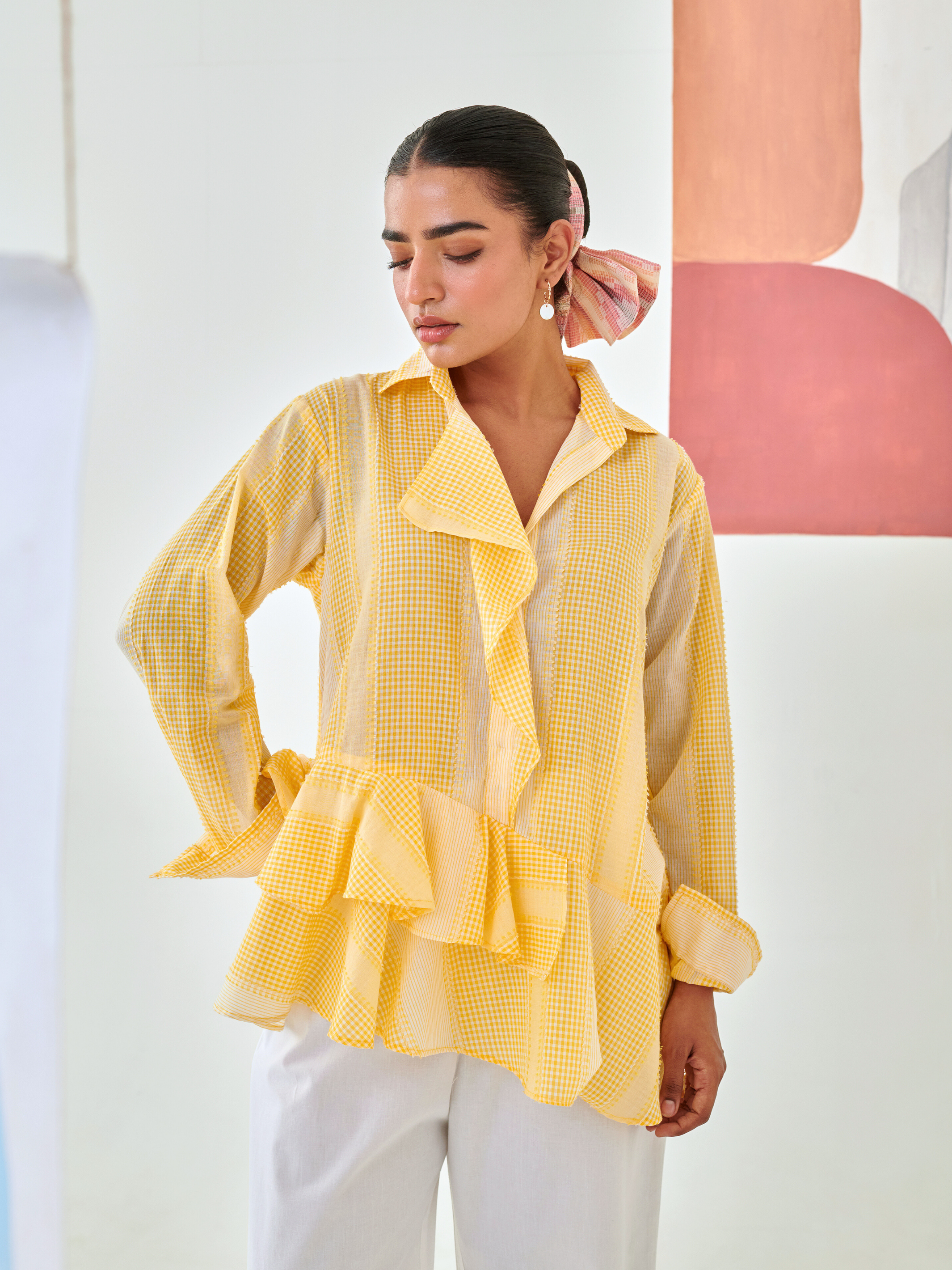 Yellow check asymmetric shirt with floral embroidery white pants