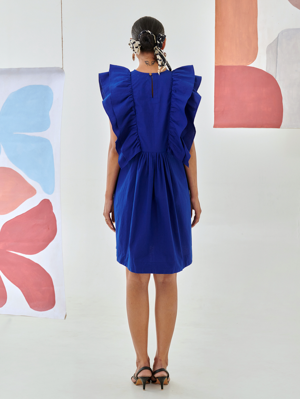 Blue short ruffled dress with pintuck detail